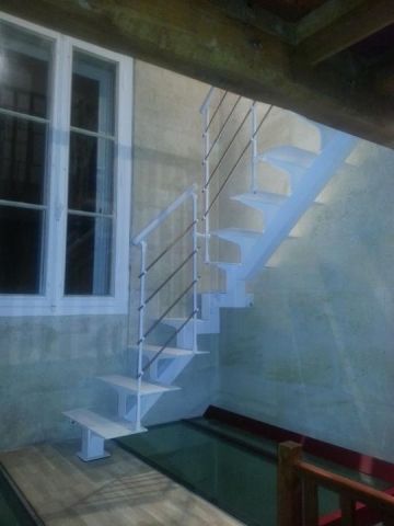 escalier limon central métal
