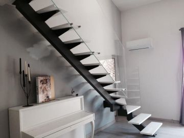 escalier limon central métal