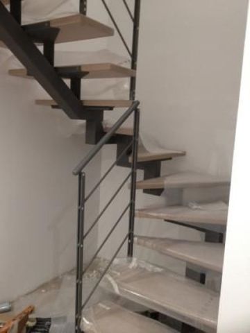 escalier limon central métal