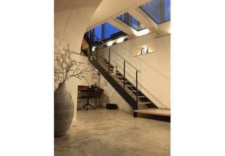 Escalier quart tournant : recommandations pour un escalier à faible reculement